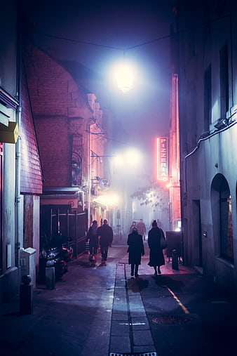 Foggy Night Street Scene with Neon Pizzeria Sign