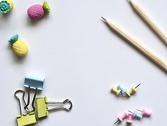 Minimalist pastel stationery flat lay with white background