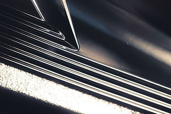 Abstract Close-Up of Chrome Metal Texture with Light Reflections