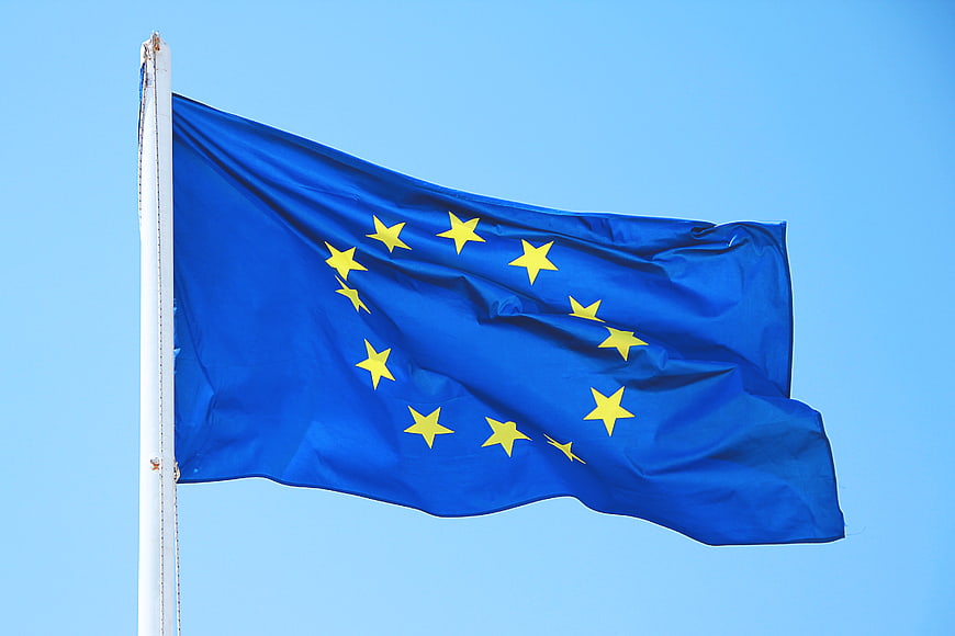 European Union Flag Waving Against Blue Sky