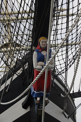 Traditional Seute Deern Figurehead on Historic Ship Mast