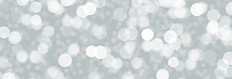 Abstract Silver Bokeh Background with Soft Light Circles