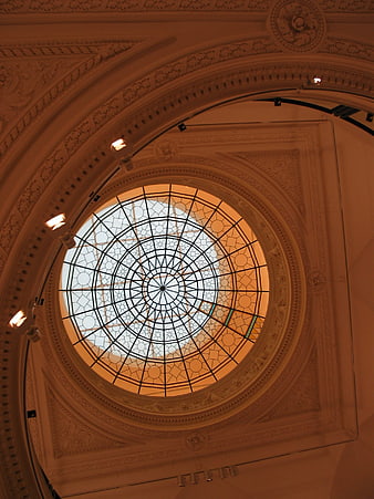 Ornate Stained Glass Dome Ceiling in Historic Building