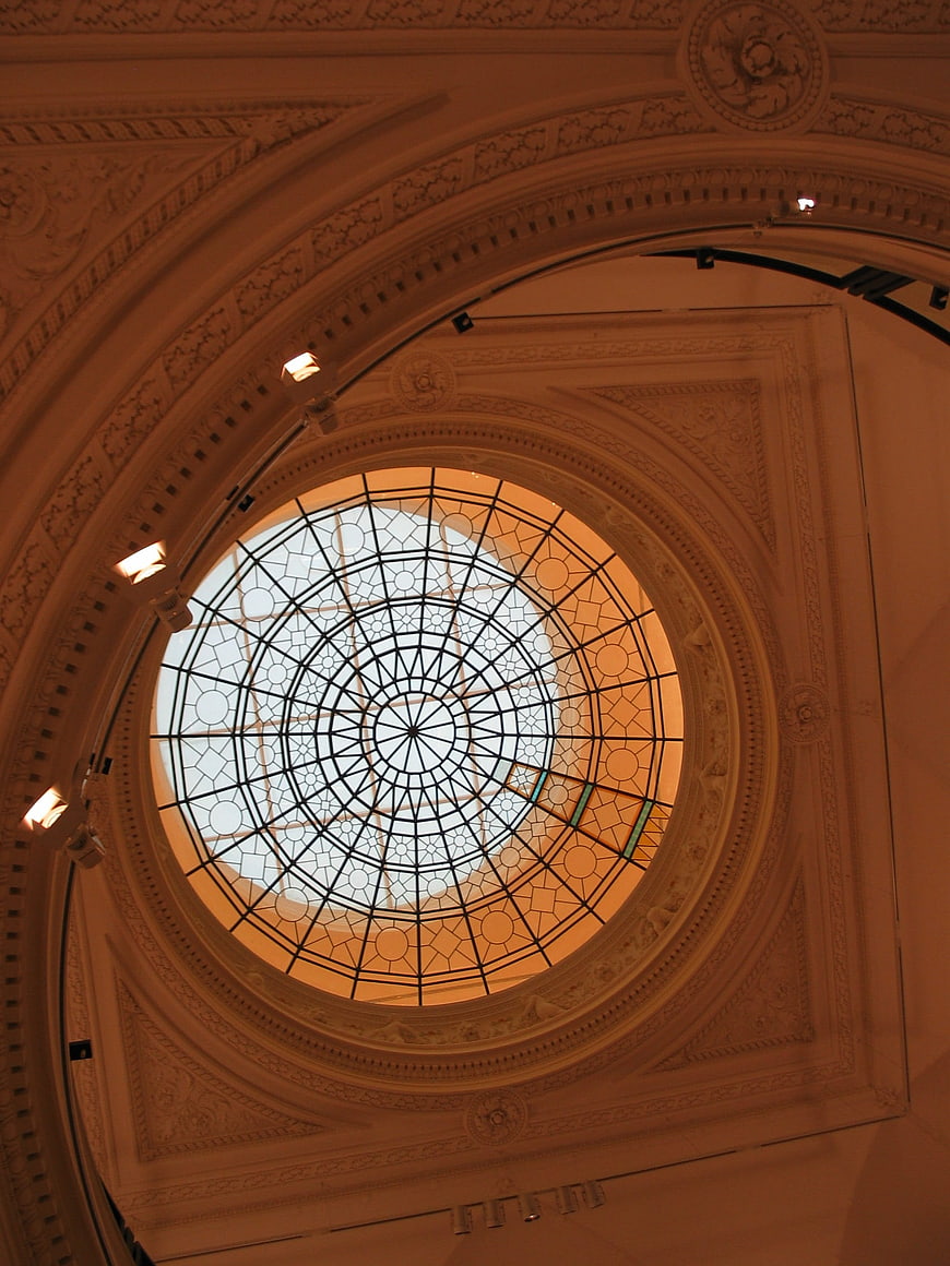 Ornate Stained Glass Dome Ceiling in Historic Building