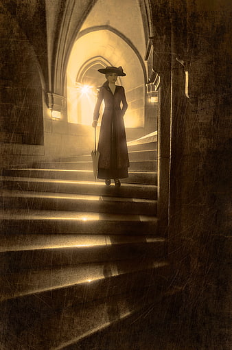 Mysterious woman in vintage coat standing on stone stairs