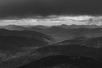 Dramatic Black and White Mountain Landscape with Stormy Sky