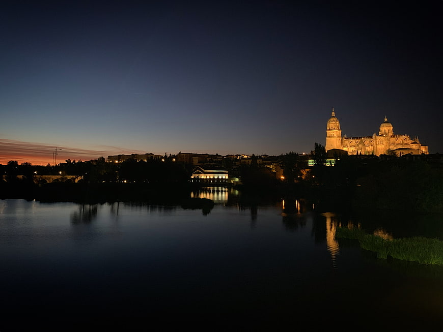 Prague Castle and Cathedral at Dusk with River Reflection