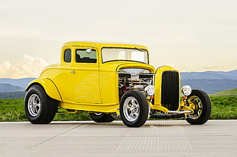 Yellow Vintage Hot Rod Coupe With Custom Chrome Wheels