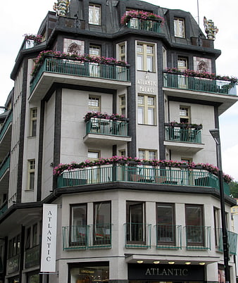 Atlantic Palace Hotel Facade in Karlovy Vary with Flower Balconies