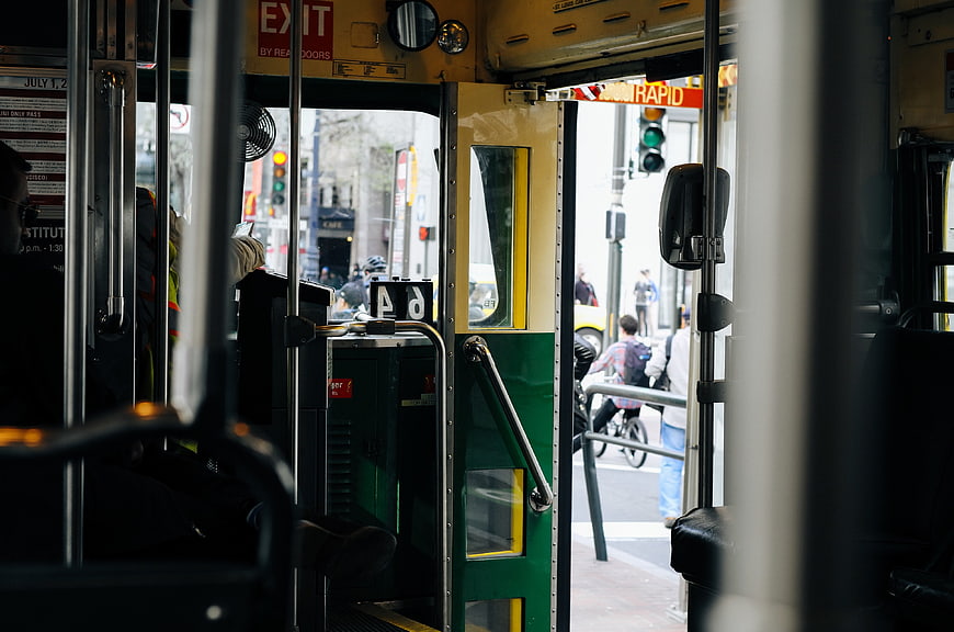 Interior View of Public Bus Looking Out Open Door