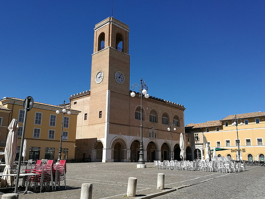 Historic Clock Tower in Italian Town Square
