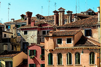Colorful Venetian rooftops and chimneys in Italy