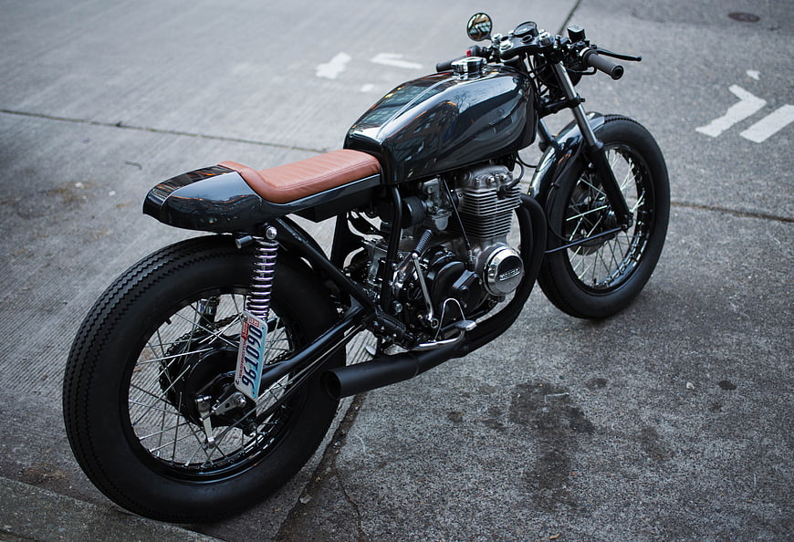 Custom Black Cafe Racer Motorcycle on Concrete