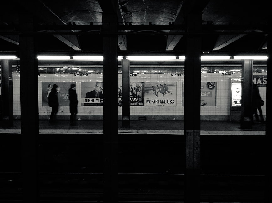 Black and white view of Nassau Street subway station platform