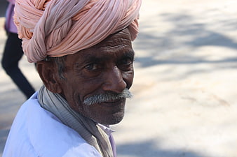 Portrait of Elderly Indian Man Wearing Traditional Pink Turban