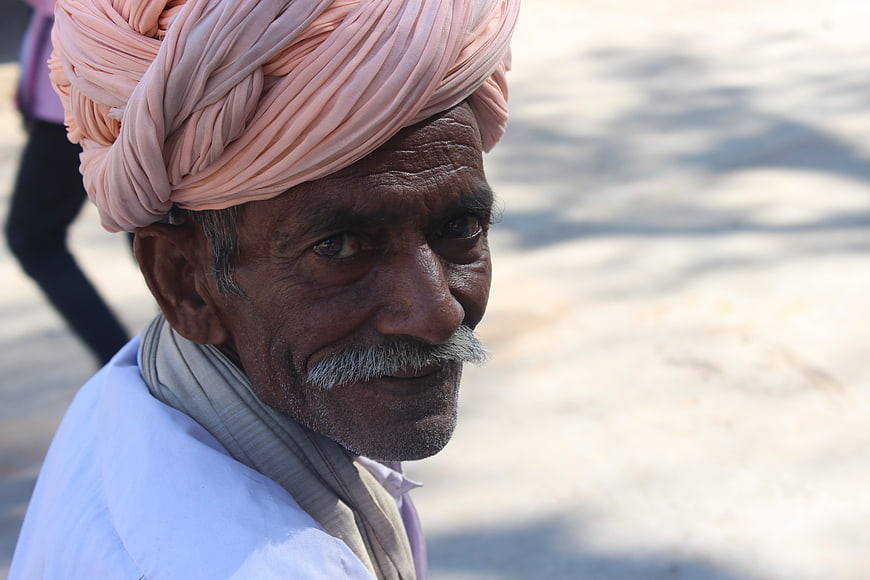 Portrait of Elderly Indian Man Wearing Traditional Pink Turban