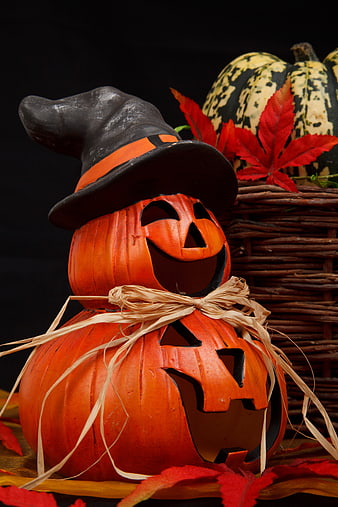 Wooden Halloween Jack-o'-Lanterns with Witch Hat and Autumn Leaves