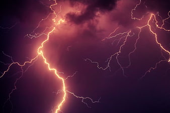 Dramatic Lightning Storm With Purple Clouds And Electric Bolts