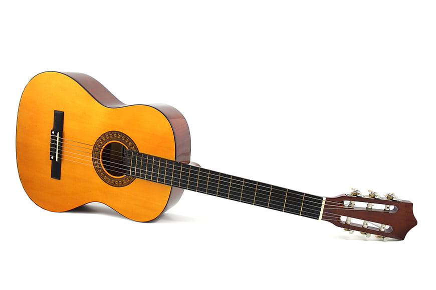 Classical acoustic guitar isolated on white background