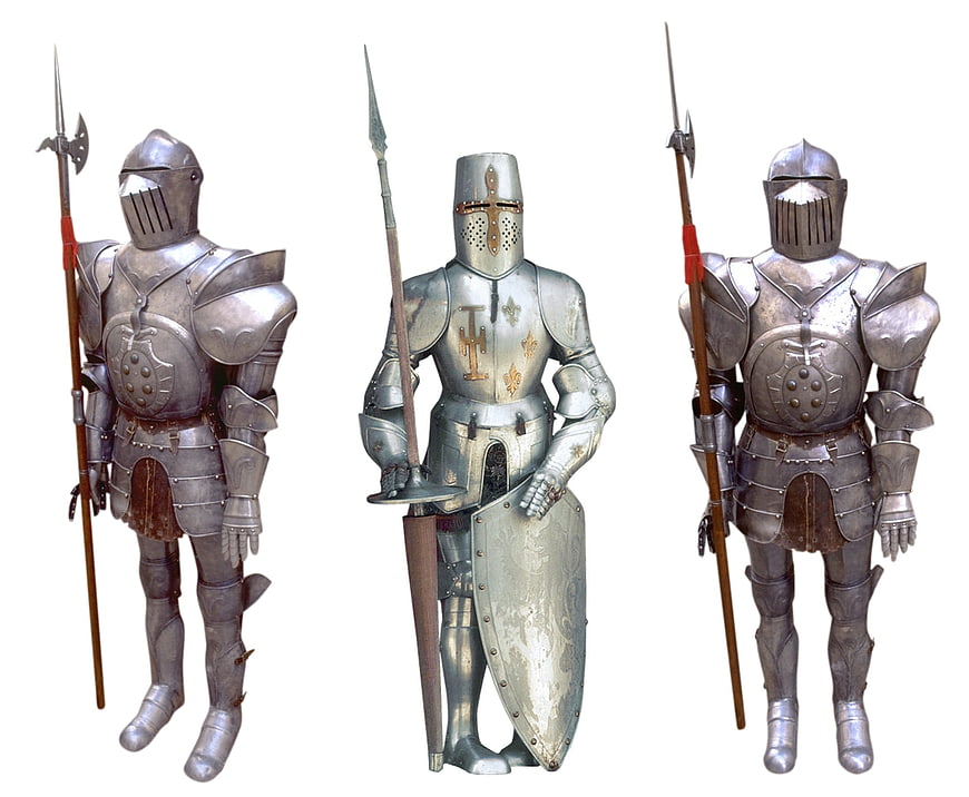 Three Suits of Medieval Knight Armor with Weapons on White Background