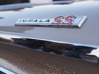 Close-up of Impala SS Badge on Classic Car