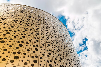 Low Angle View of Modern Perforated Metal Building Facade