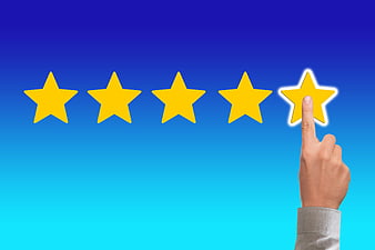Hand Selecting Five Star Rating On Blue Gradient Background