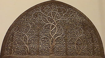 Ornate Islamic Arch with Intricate Tree of Life Carving