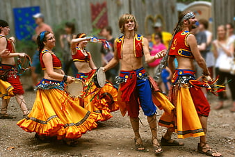 Young Gypsy Dancers Performing Traditional Dance With Drums