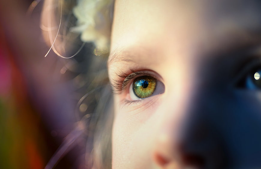 Close-up Portrait of a Child's Green Eye