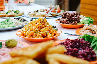 Colorful vegetable salads and appetizers on a buffet table