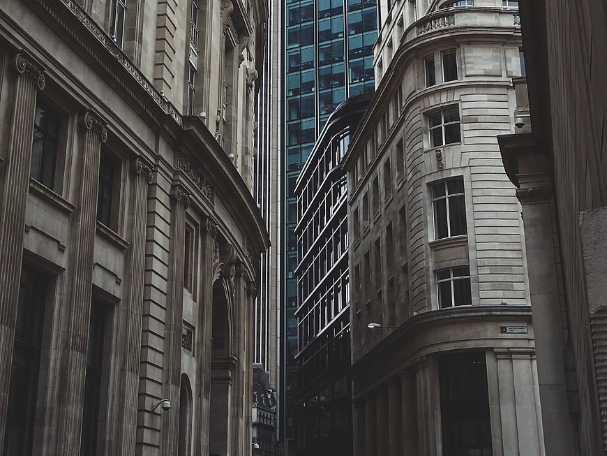 Low angle view of historic and modern city architecture