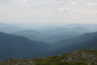 Scenic Mountain Range Landscape with Hazy Blue Peaks