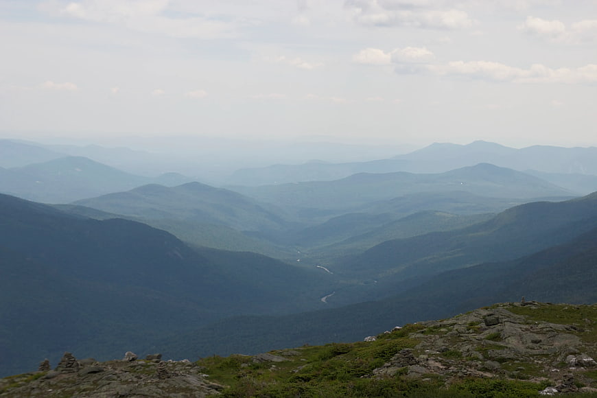 Scenic Mountain Range Landscape with Hazy Blue Peaks