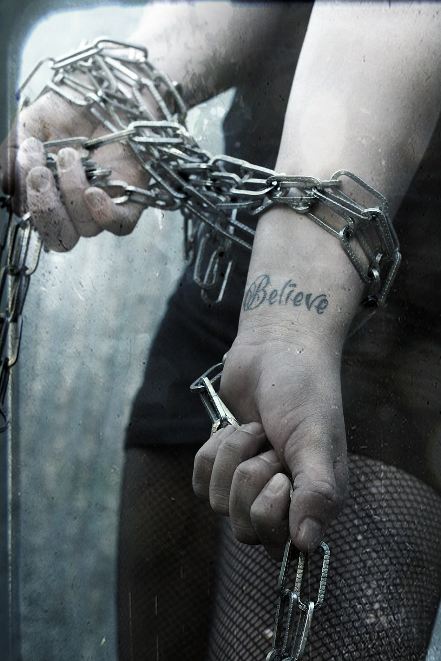 Chained Hands with Believe Tattoo Concept