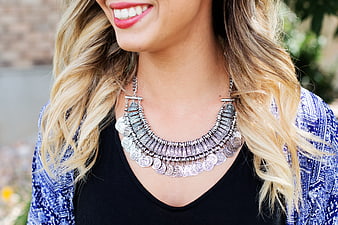 Woman Wearing Silver Coin Statement Necklace