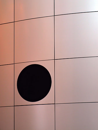 Abstract geometric circle on modern building facade