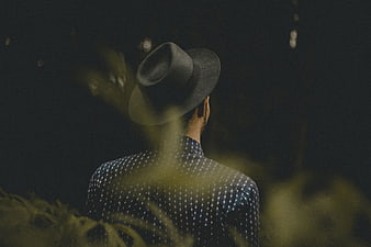 Man in Fedora and Polka Dot Shirt from Behind