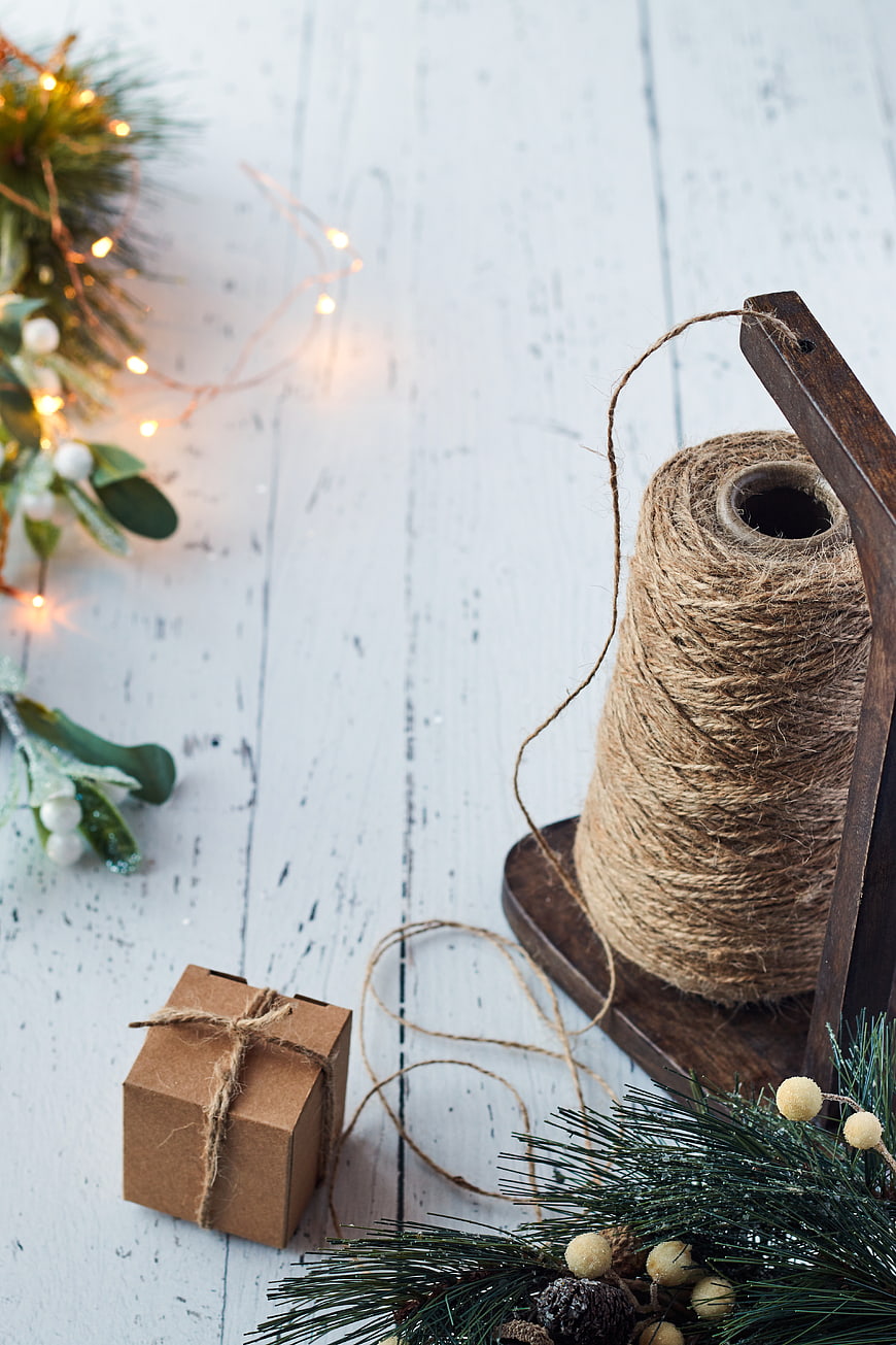 Rustic Christmas Gift Box with Twine and Pine Branches