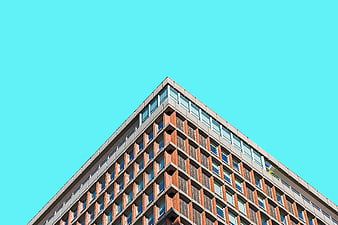 Modern Brick Building Corner Against Blue Sky