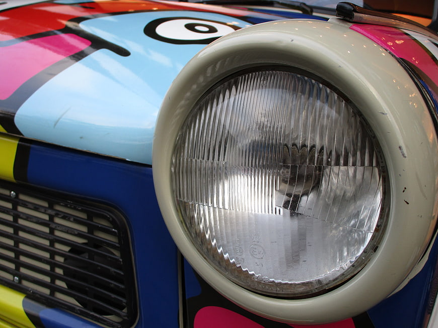 Close-up of colorful Trabant 601 headlight and grille