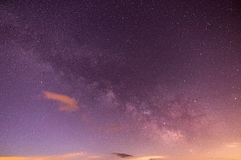 Purple Milky Way Night Sky with Stars and Clouds