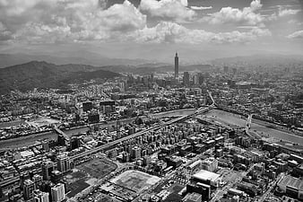Black and white aerial view of Taipei cityscape with Taipei 101