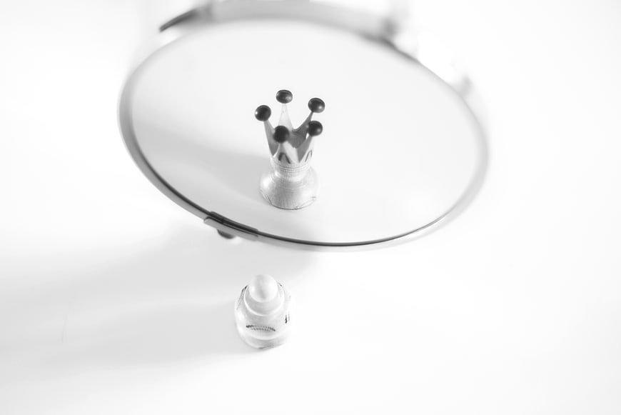 Chess Queen and Pawn Reflection in Mirror