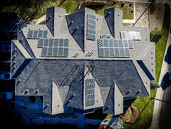 Aerial view of residential roof with solar panels