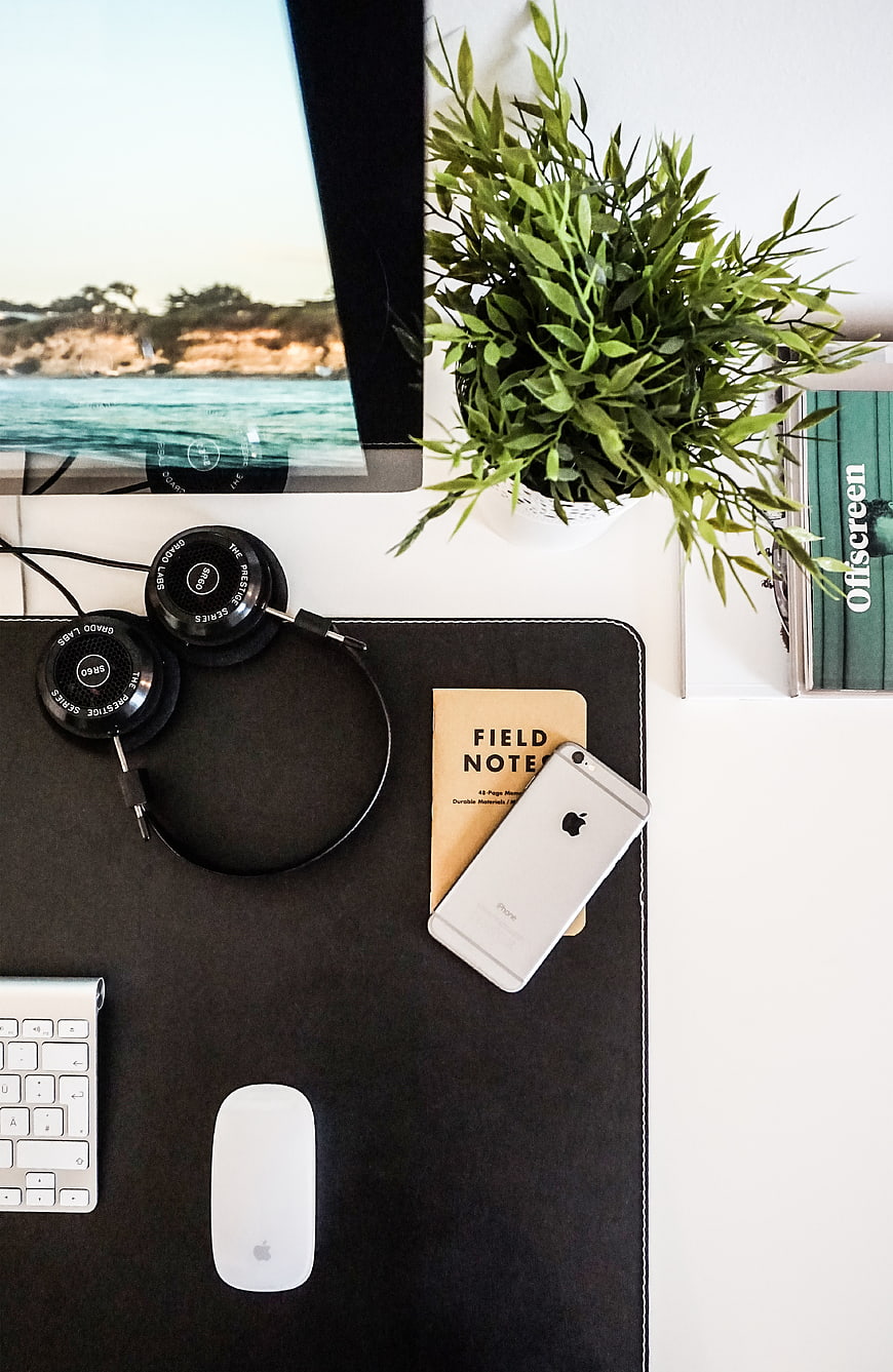 Minimalist Workspace Flat Lay with Tech and Plant
