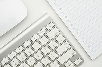 Minimalist Office Desk with Keyboard and Notepad