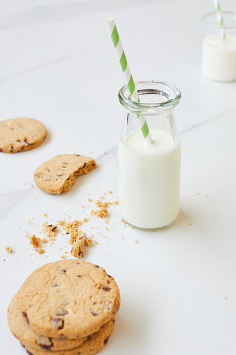 Chocolate Chip Cookies and Milk in Glass Bottle