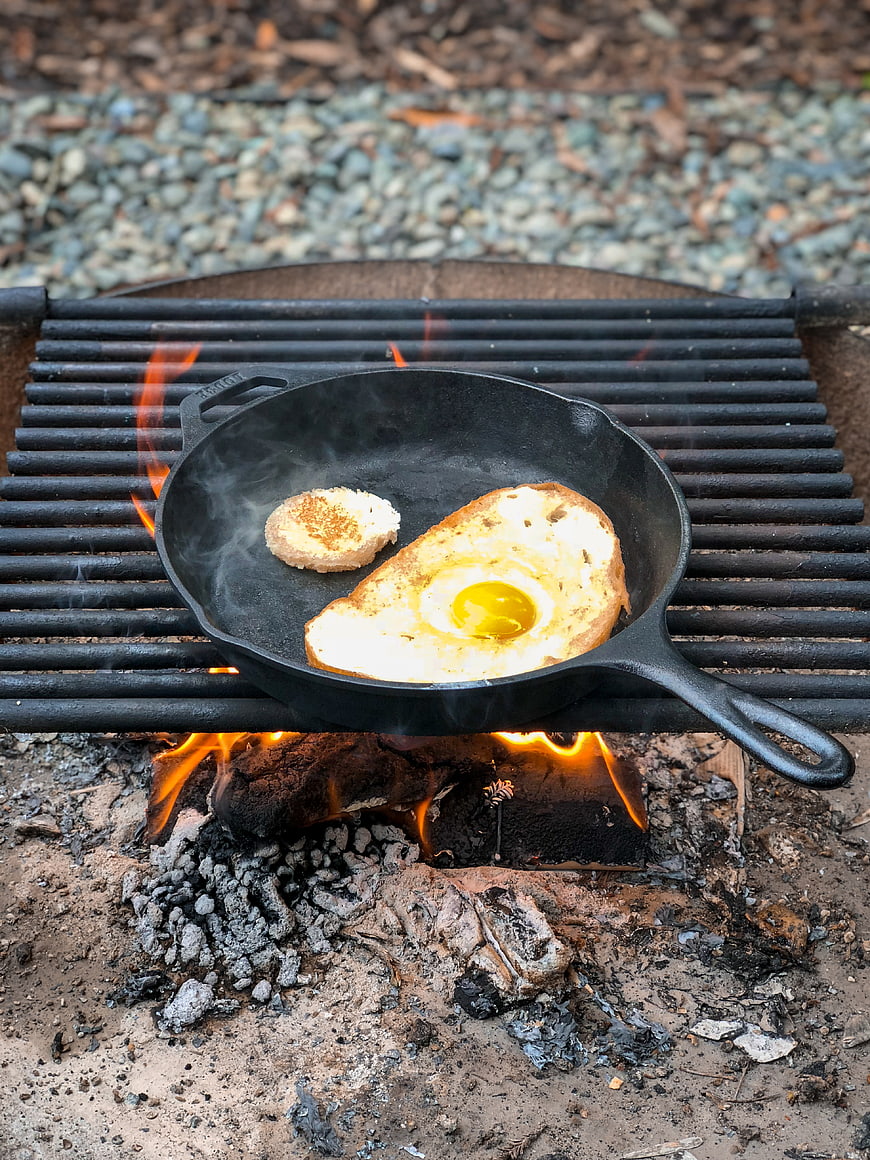 Camping Breakfast: Eggs and Toast in Cast Iron Skillet