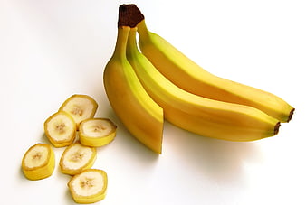 Fresh Yellow Bananas and Slices Isolated on White Background